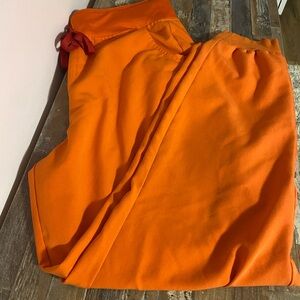Orange women’s large Figs jogger scrub pants